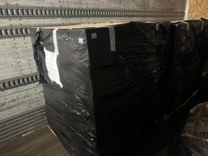 Mystery black wrap pallets go out 🤔